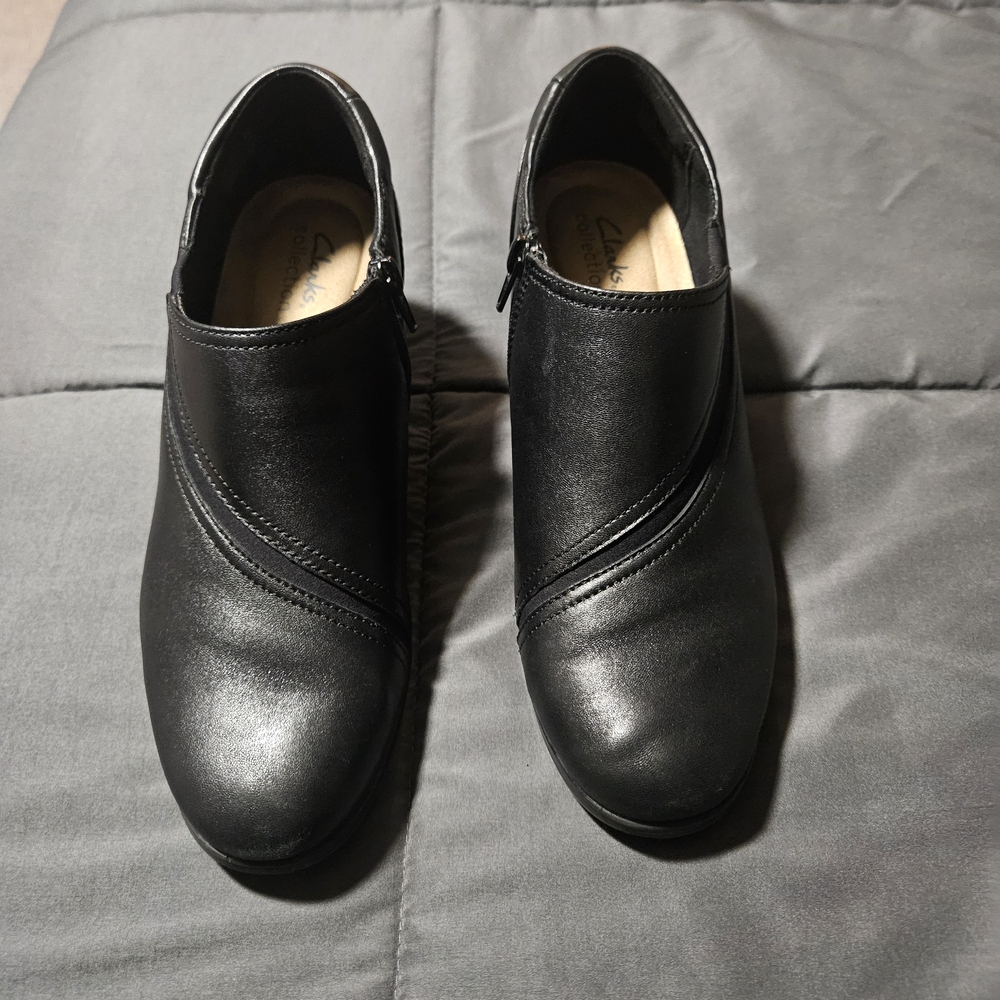 Clarks Black Slip-On Women's Loafers with Diagonal Stitch Accent